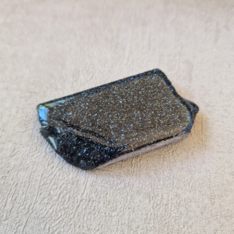 Spécularite - tranche, une face polie