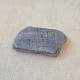 Spécularite - tranche, une face polie