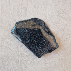 Spécularite - tranche, une face polie