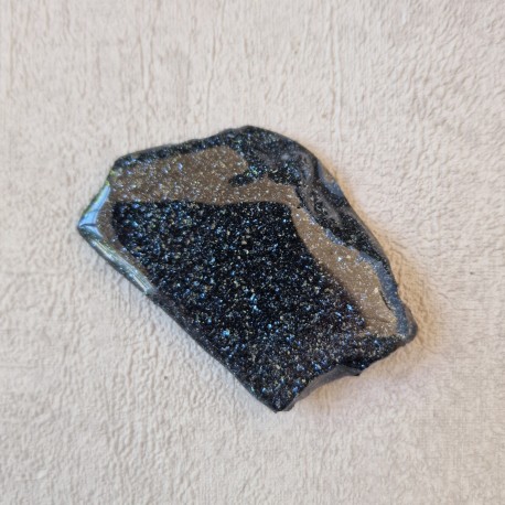 Spécularite - tranche, une face polie