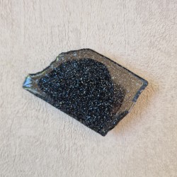 Spécularite - tranche, une face polie