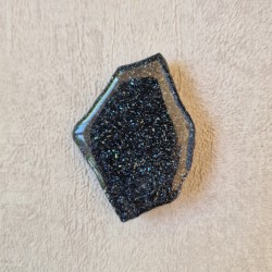 Spécularite - tranche, une face polie