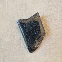 Spécularite - tranche, une face polie